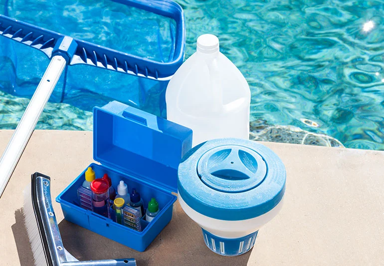 adjusting the chemical levels of the pool water